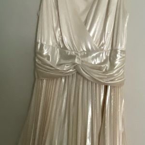Party dress dripped in champagne color and shine